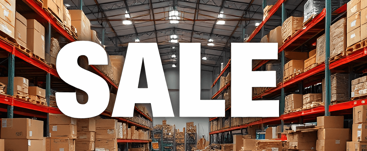 huge_warehouse_with_boxes_SALE__522737760 (1) (2) (1).png